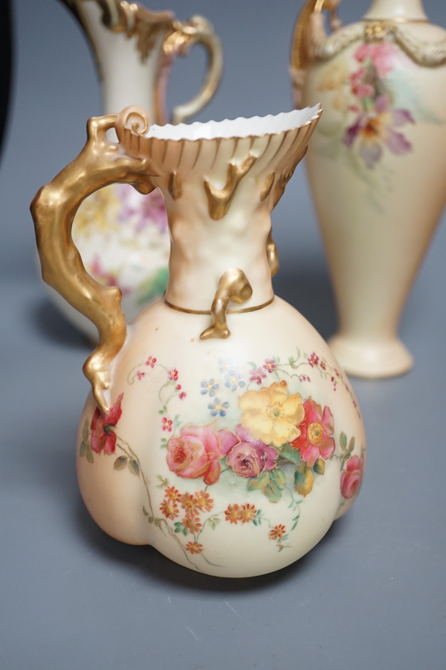 A Worcester blush ivory - a bottle vase and 3 jugs, tallest 27cms high